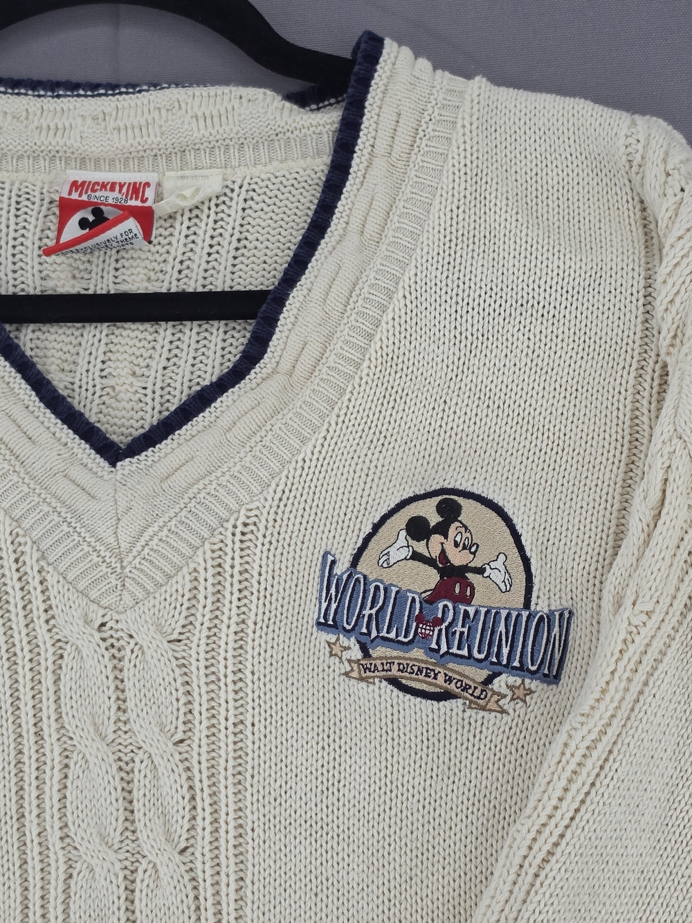 Disney Cream V-Neck Cable Knit Sweater with Navy Trim & Mickey Patch